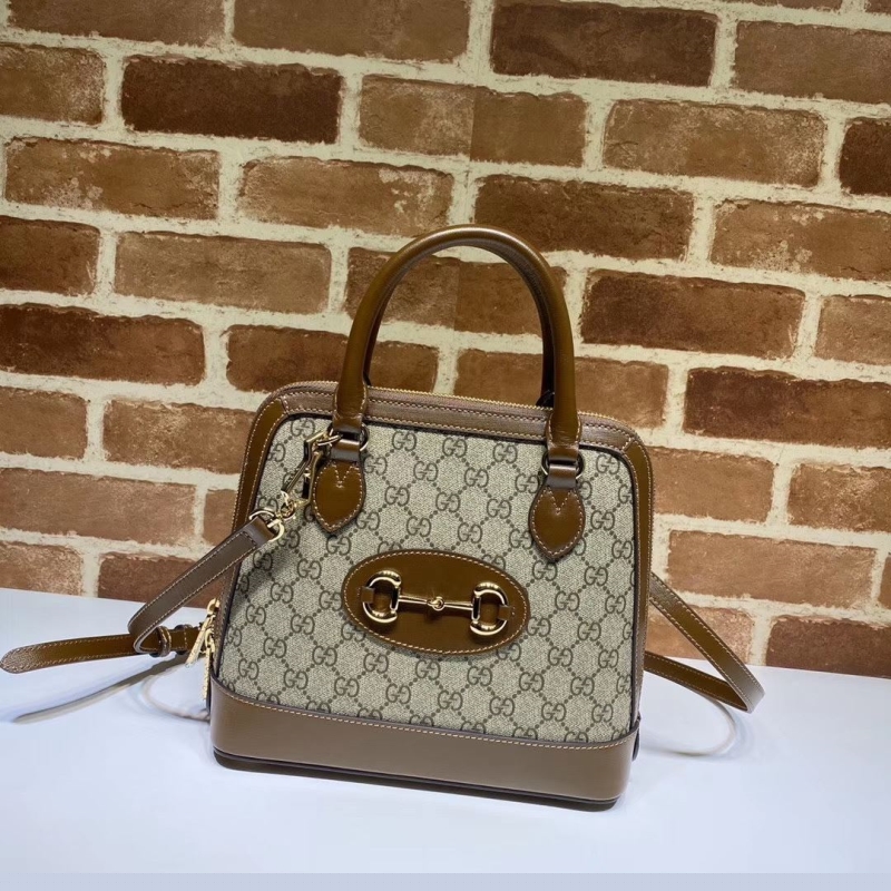 G*u*i top handle bags
